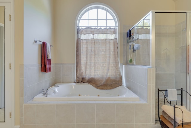 bathroom with independent shower and bath