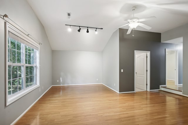 bonus room with lofted ceiling, ceiling fan, and light hardwood / wood-style flooring