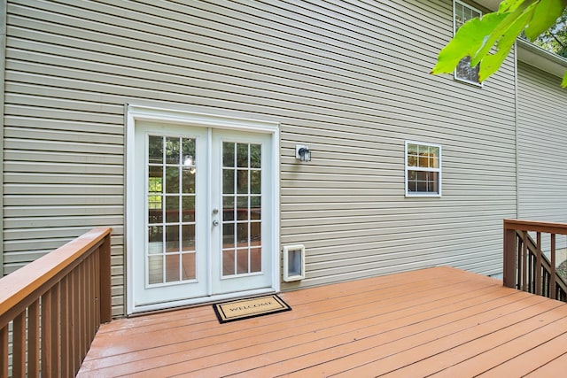 wooden deck featuring french doors