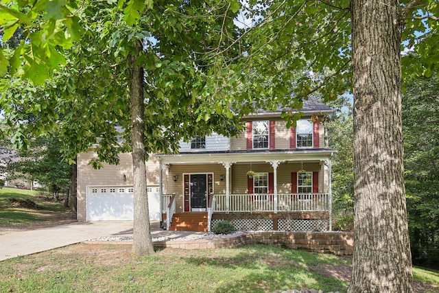 view of front of house featuring a porch and a garage