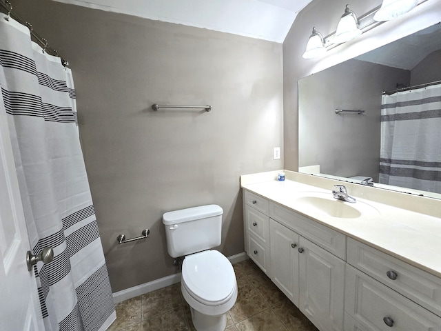 bathroom with vanity, toilet, curtained shower, tile patterned floors, and vaulted ceiling