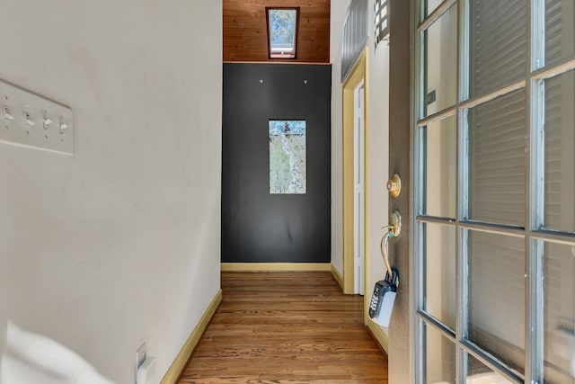 hallway featuring hardwood / wood-style flooring