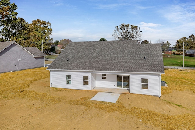 back of property featuring a patio