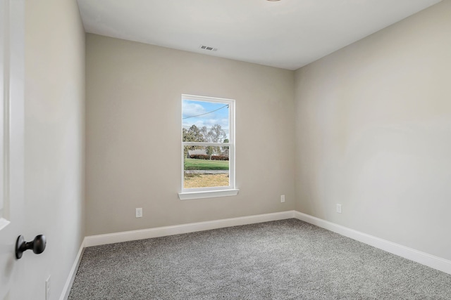 empty room with carpet flooring