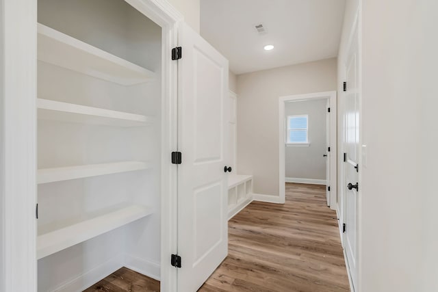 hall featuring light hardwood / wood-style flooring