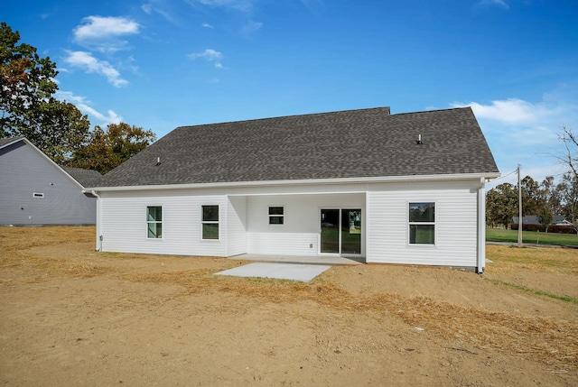 back of property with a patio area