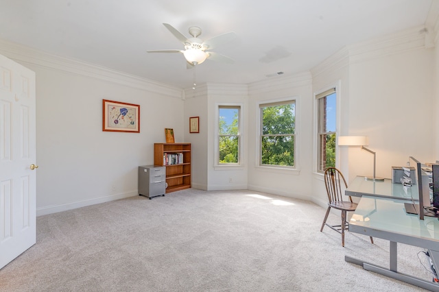 office area with ceiling fan, light colored carpet, and crown molding