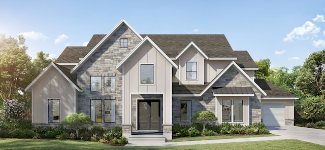 view of front of house with a front lawn and a garage