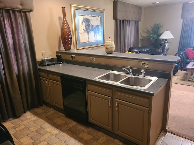 kitchen featuring black dishwasher, sink, and light carpet