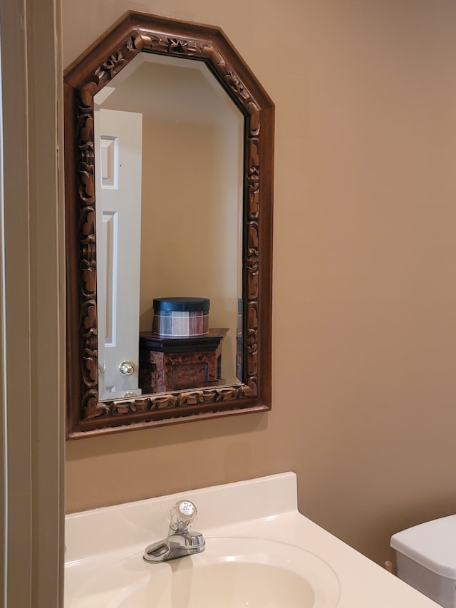 bathroom with sink and toilet