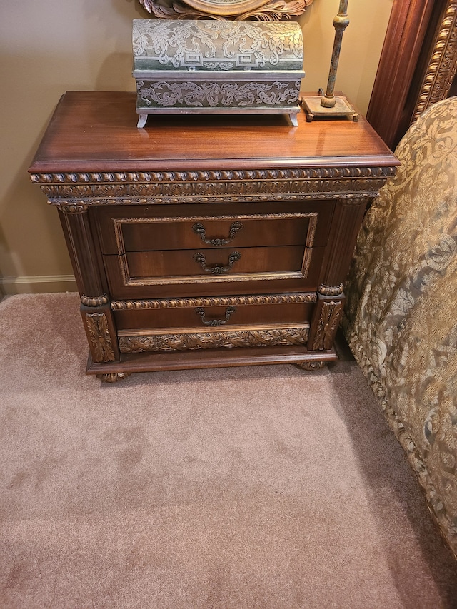 interior details featuring carpet flooring