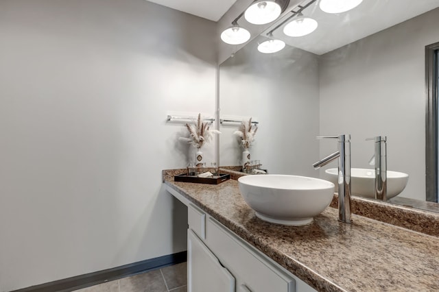 bathroom with vanity and tile patterned floors