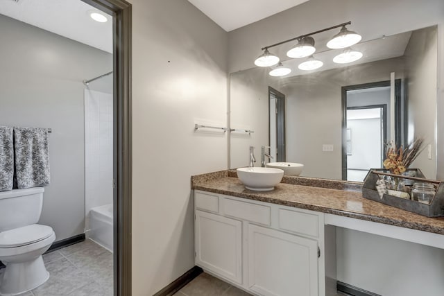 full bathroom with tile patterned floors, vanity,  shower combination, and toilet