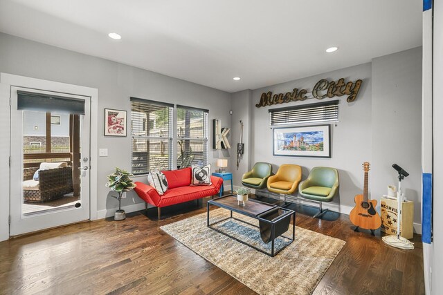 living room featuring dark wood-type flooring