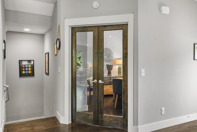 interior space featuring dark hardwood / wood-style floors and french doors