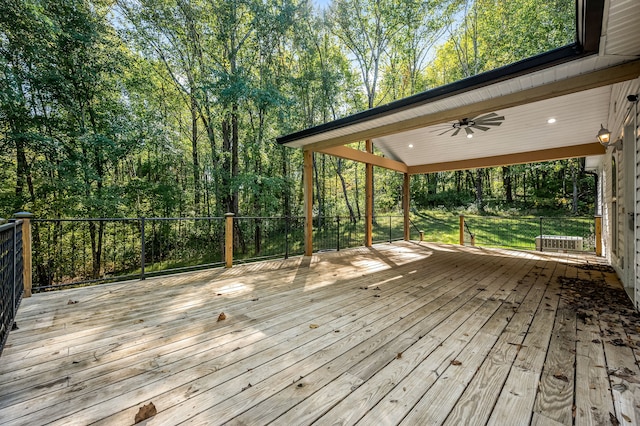 wooden deck featuring ceiling fan