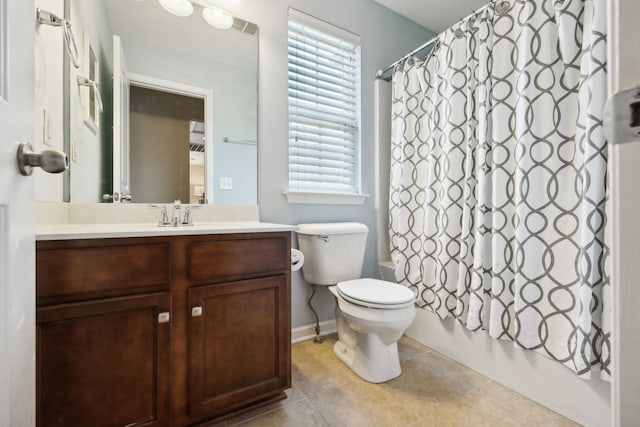 full bathroom featuring shower / tub combo with curtain, vanity, toilet, and tile patterned floors