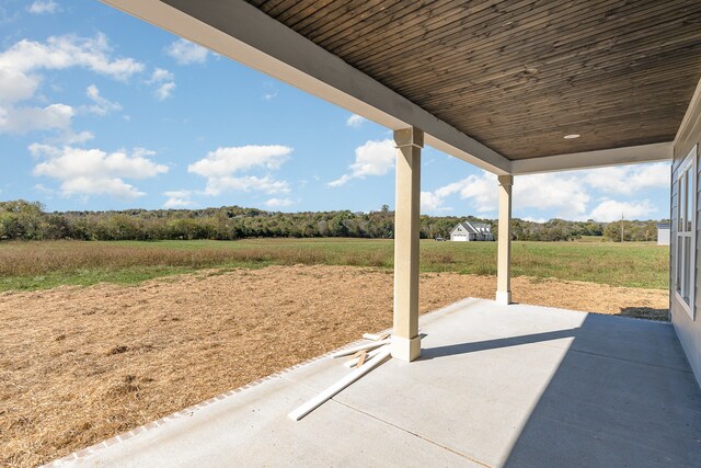 view of patio / terrace with a rural view