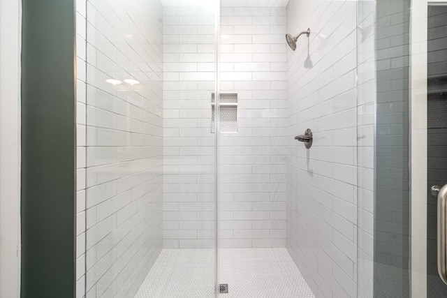 bathroom featuring walk in shower