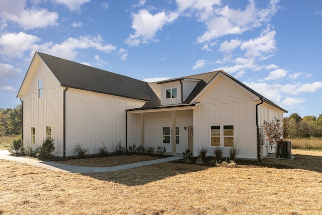 modern inspired farmhouse featuring cooling unit