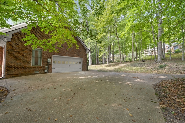 view of property exterior with a garage