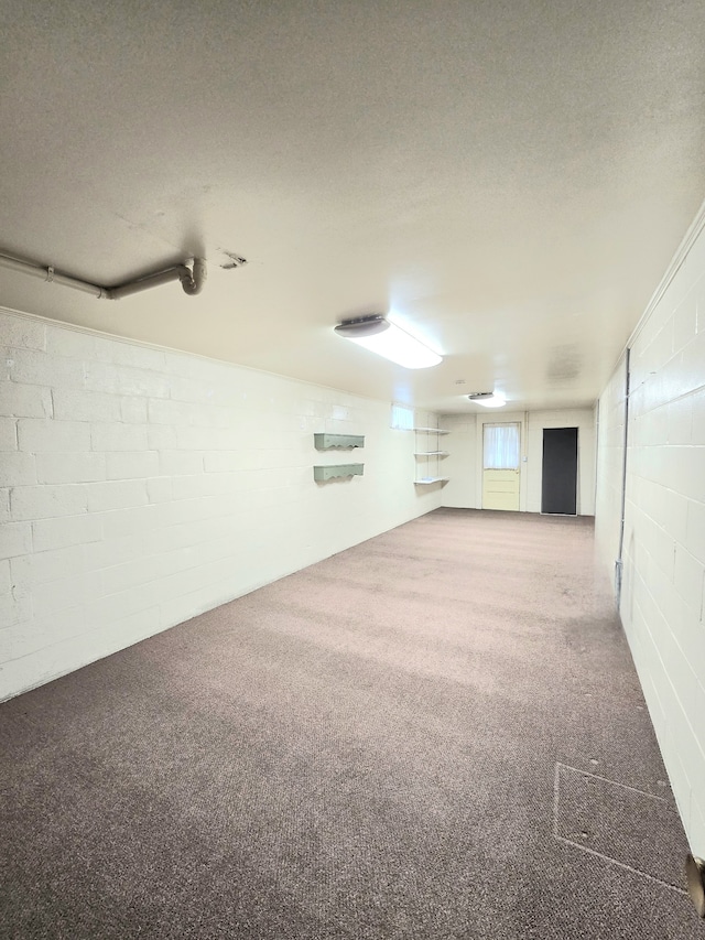 interior space with a textured ceiling