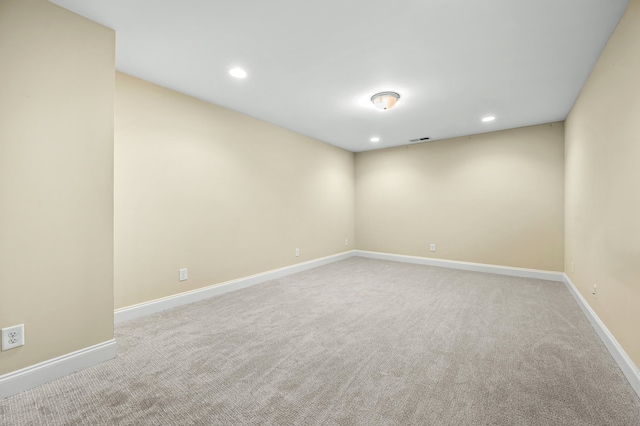 unfurnished room with carpet flooring