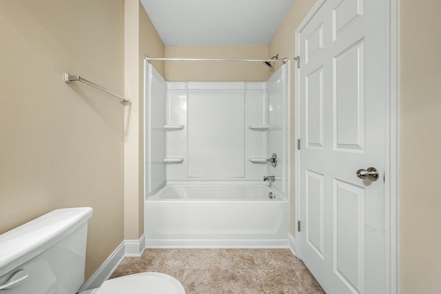 bathroom with shower / bathtub combination and toilet