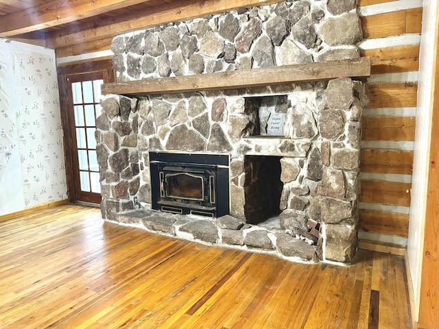 room details with a fireplace and wood finished floors