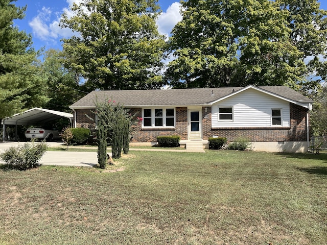 ranch-style home with a carport and a front lawn