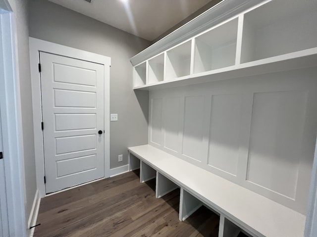 mudroom with dark hardwood / wood-style floors