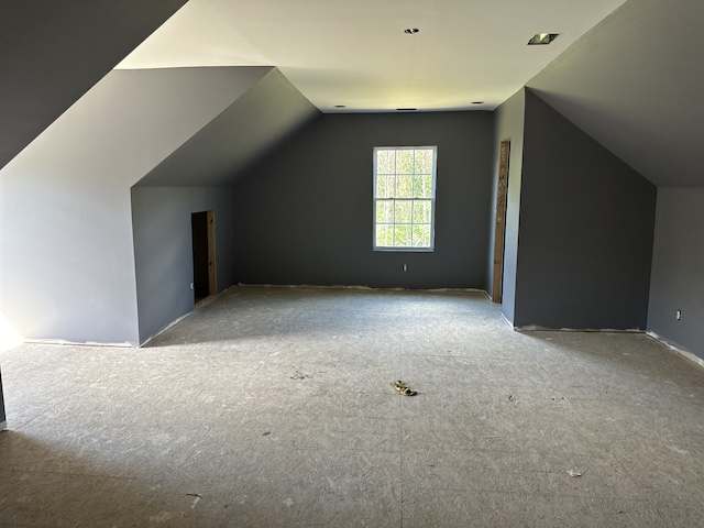 bonus room featuring lofted ceiling