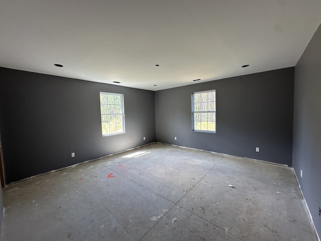 spare room featuring a wealth of natural light