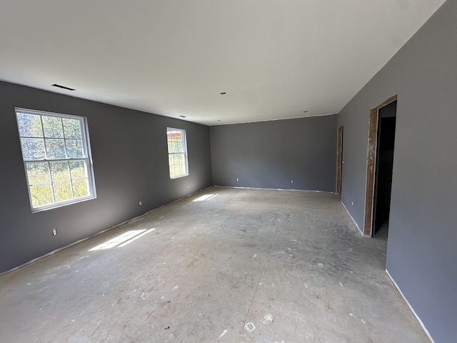 empty room featuring plenty of natural light