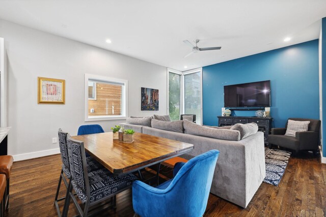 dining room featuring ceiling fan and dark hardwood / wood-style flooring