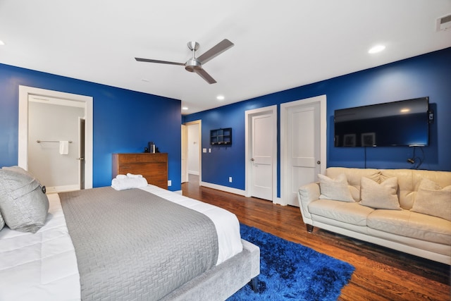 bedroom featuring ceiling fan and dark hardwood / wood-style floors