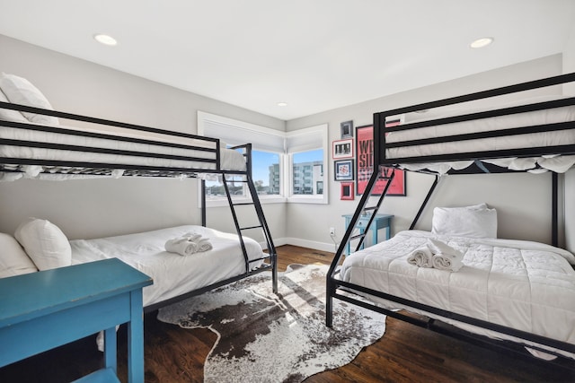 bedroom with hardwood / wood-style flooring