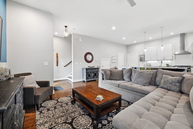 living room with sink and hardwood / wood-style flooring