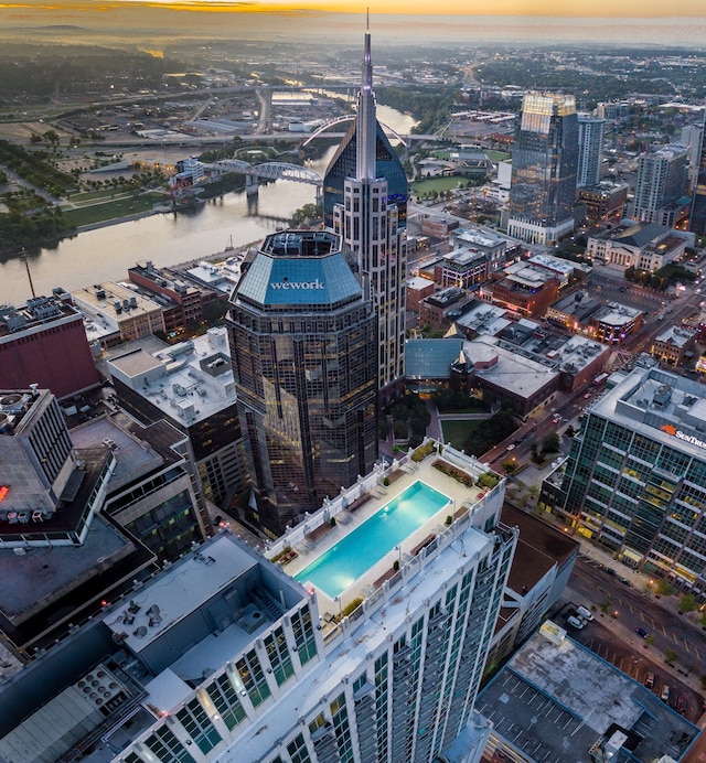 aerial view at dusk with a water view