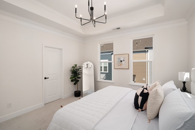 bedroom with crown molding, a chandelier, light carpet, and a raised ceiling