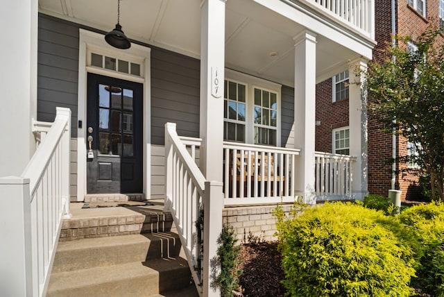 entrance to property with a porch