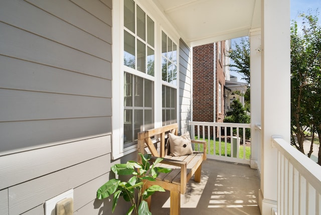 balcony featuring a porch