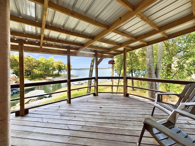 wooden terrace with a water view