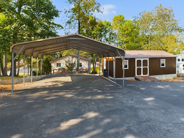 exterior space featuring a carport