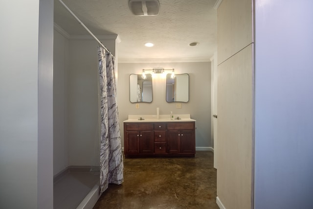 bathroom featuring curtained shower, vanity, a textured ceiling, concrete flooring, and ornamental molding