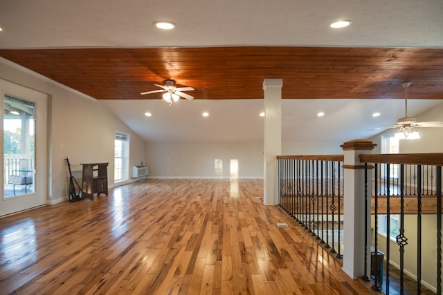 unfurnished room with light hardwood / wood-style flooring, vaulted ceiling, ceiling fan, and wooden ceiling