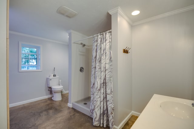 bathroom with walk in shower, ornamental molding, sink, and toilet