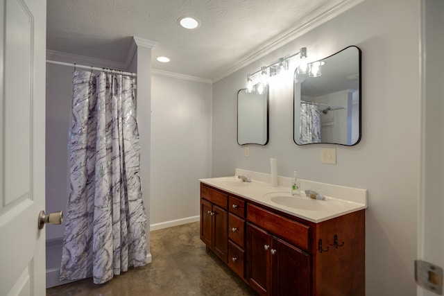 bathroom featuring a shower with curtain, vanity, crown molding, and a textured ceiling