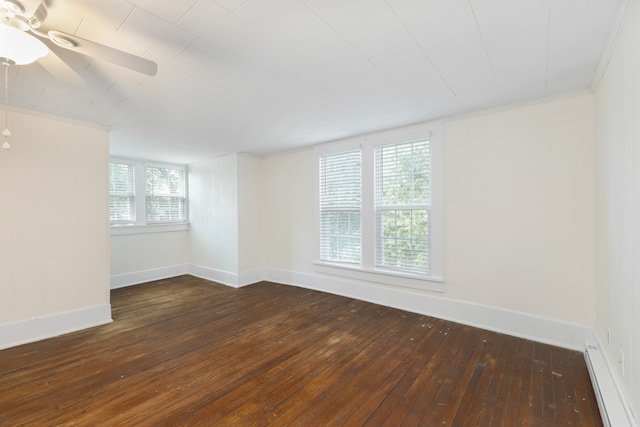 empty room featuring ornamental molding, ceiling fan, and dark hardwood / wood-style flooring