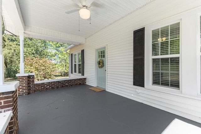 view of patio featuring ceiling fan